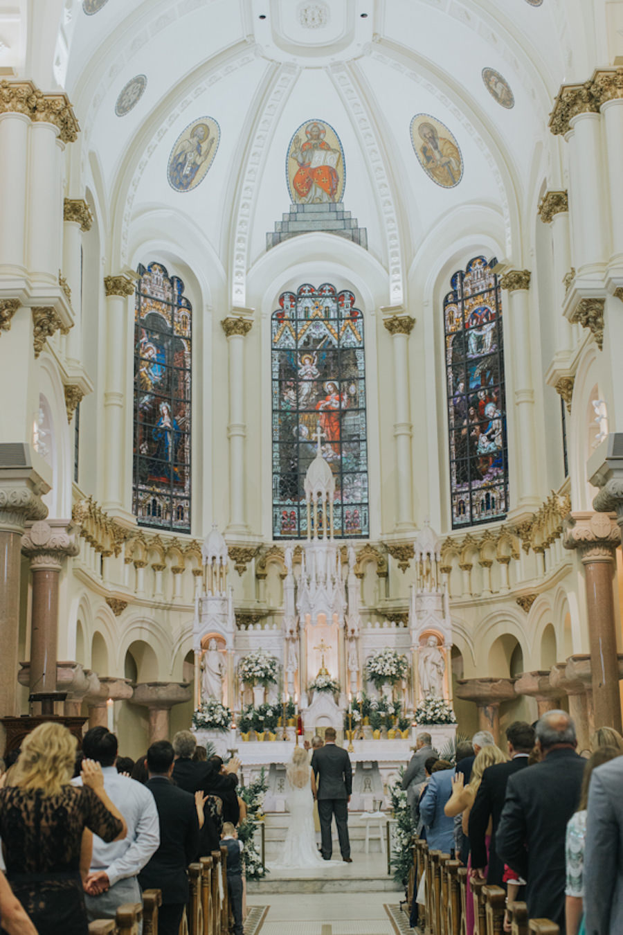 Bride and Groom Exchange Vows at Wedding Ceremony | Historic Downtown Tampa Wedding Venue Sacred Heart Catholic Church