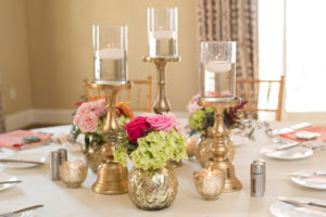 St. Pete Wedding Reception Decor with Pink and Green Floral Table Centerpieces and Tall, Gold Candles | St. Pete Wedding Venue Loews Don CeSar