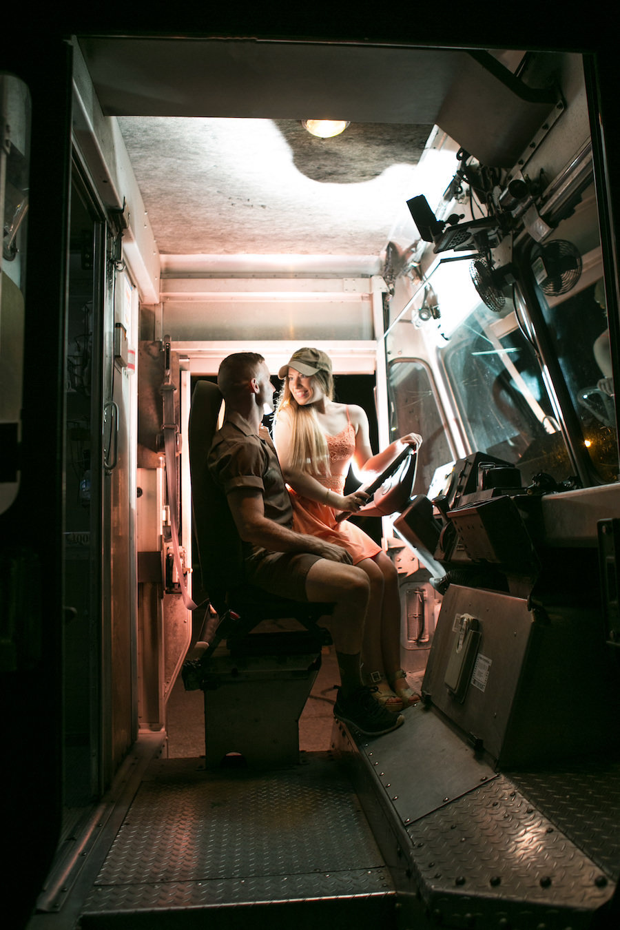 Fun and Playful Engagement Portrait Inside UPS Truck | Fiancé Works For UPS Engagement Shoot | Unique Engagement Session Ideas | Tampa Fl Wedding Photographer Carrie Wildes Photography