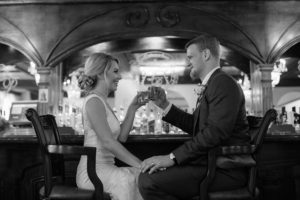 Bride and Groom Wedding Portrait Toasting Drinks at Indoor, Vintage Bar | Downtown Tampa Hotel Wedding Venue The Floridan Palace