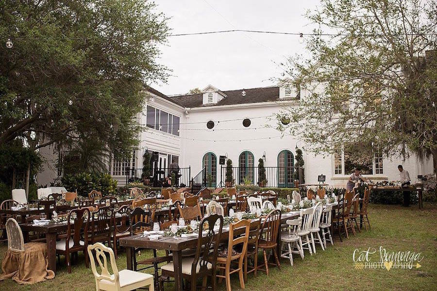 Outdoor Family Style Wedding Reception Seating and Table Set up | Tampa Bay Vintage Wedding Furniture and Rentals | The Reserve Vintage Rentals