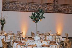Indoor, Ballroom Wedding Reception with Gold Chiavari Chairs, Orange Tree Centerpieces, and Gold Chargers | Downtown Tampa Wedding Venue The Floridan Palace