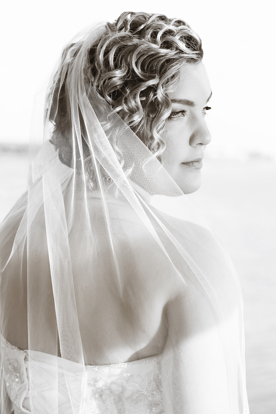 Curly, Wavy, Bridal Hair and Makeup Wedding Portrait with Wedding Veil