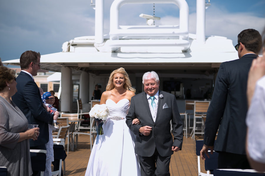 Bride and Dad walking Down Aisle at Tampa Waterfront Wedding Ceremony on the Yacht Starship Sensation | Tampa Wedding Photographer Carrie Wides Photography