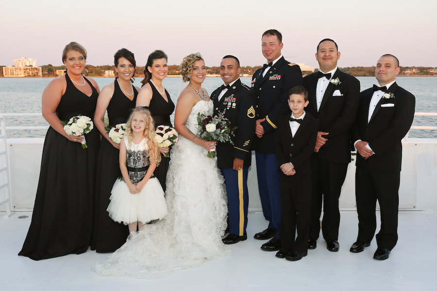 Bridal Party Wedding Portrait in Black Bridesmaids Dresses, Black Groomsmen Suits and Army Miltary Dress Uniform