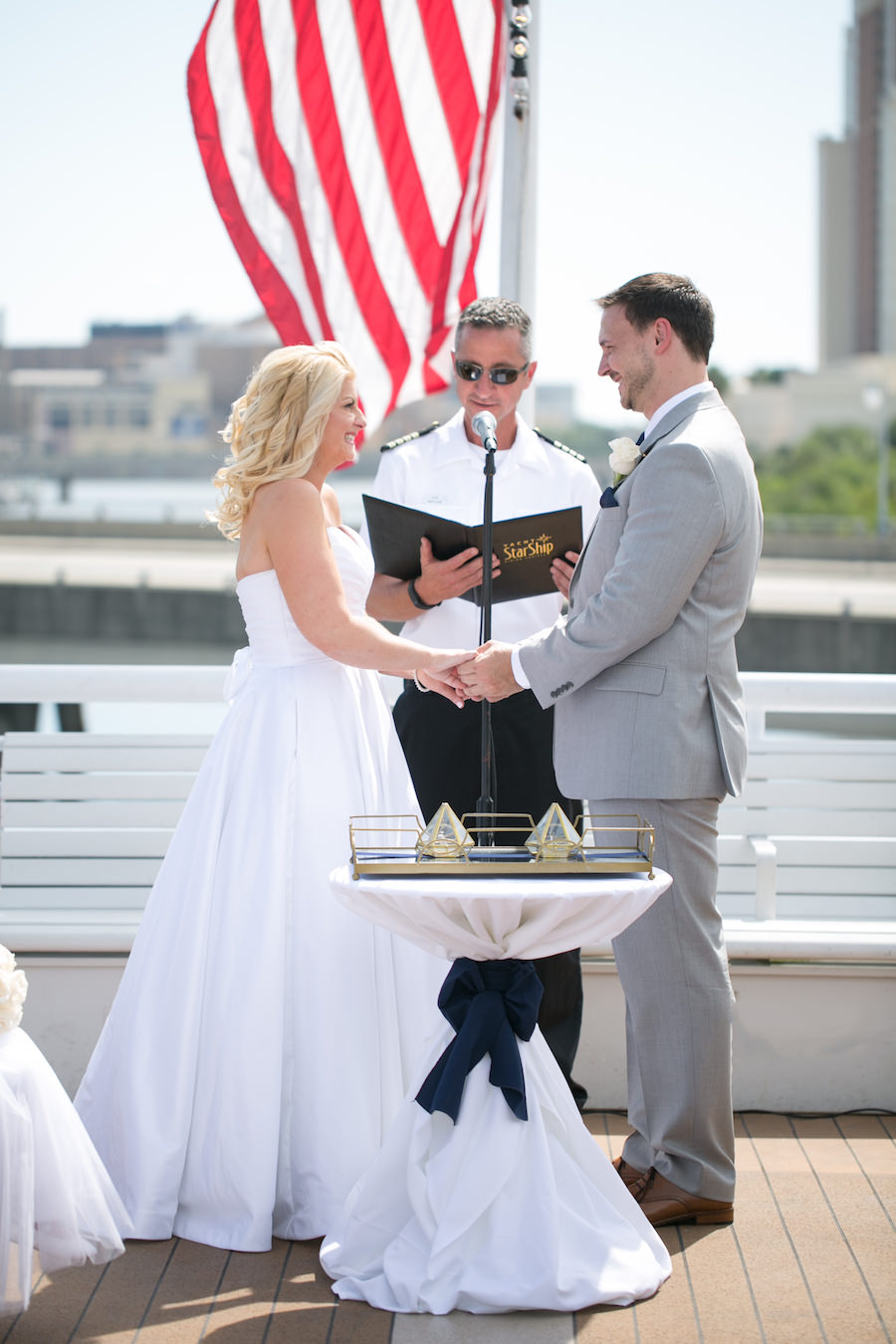 Bride and Groom Exchanging Vows at Tampa Waterfront Wedding Ceremony on the Yacht Starship Sensation | Tampa Wedding Photographer Carrie Wides Photography