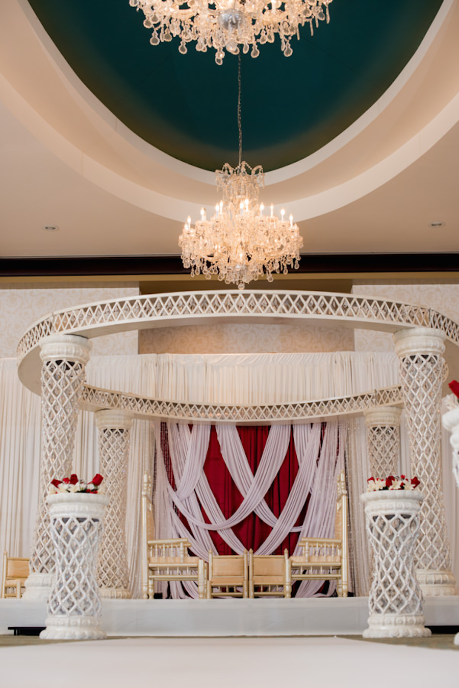 Wedding Ceremony with White and Red Altar and Floral Décor at Tampa Bay Wedding Venue, The Palmetto Club at Fishhawk Ranch