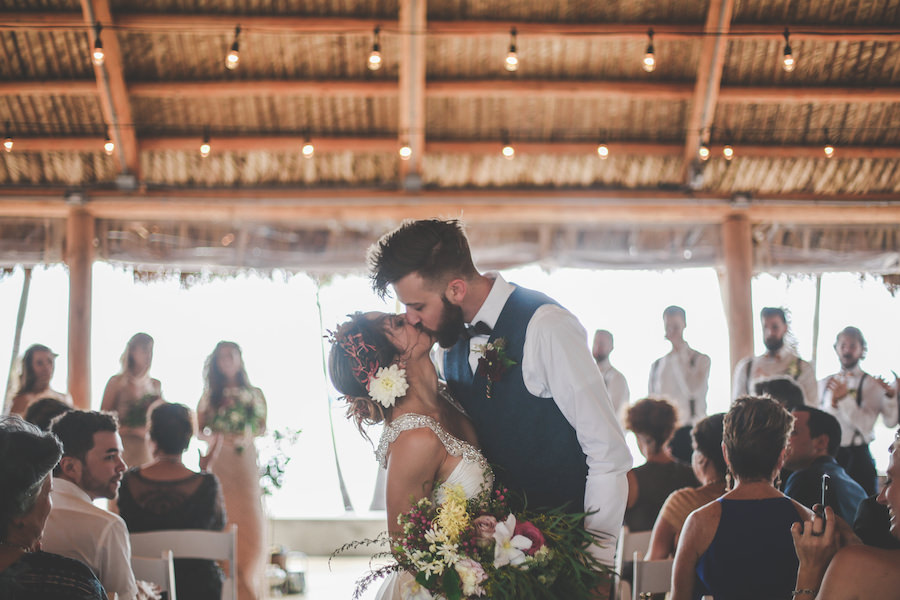 Bride and Groom Kissing at St. Pete Wedding Ceremony