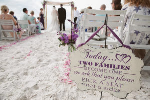 Purple Wedding Aisle Ceremony Decor with Wood Family Sign | Clearwater Beach Wedding Florist Iza's Flowers | Beach Wedding Ideas and Inspiration | Clearwater Beach Wedding Venue Hilton Clearwater Beach