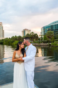 Bride and Groom Watefront Wedding Portrait at Sunset | Downtown Tampa Wedding Venue Yacht StarShip
