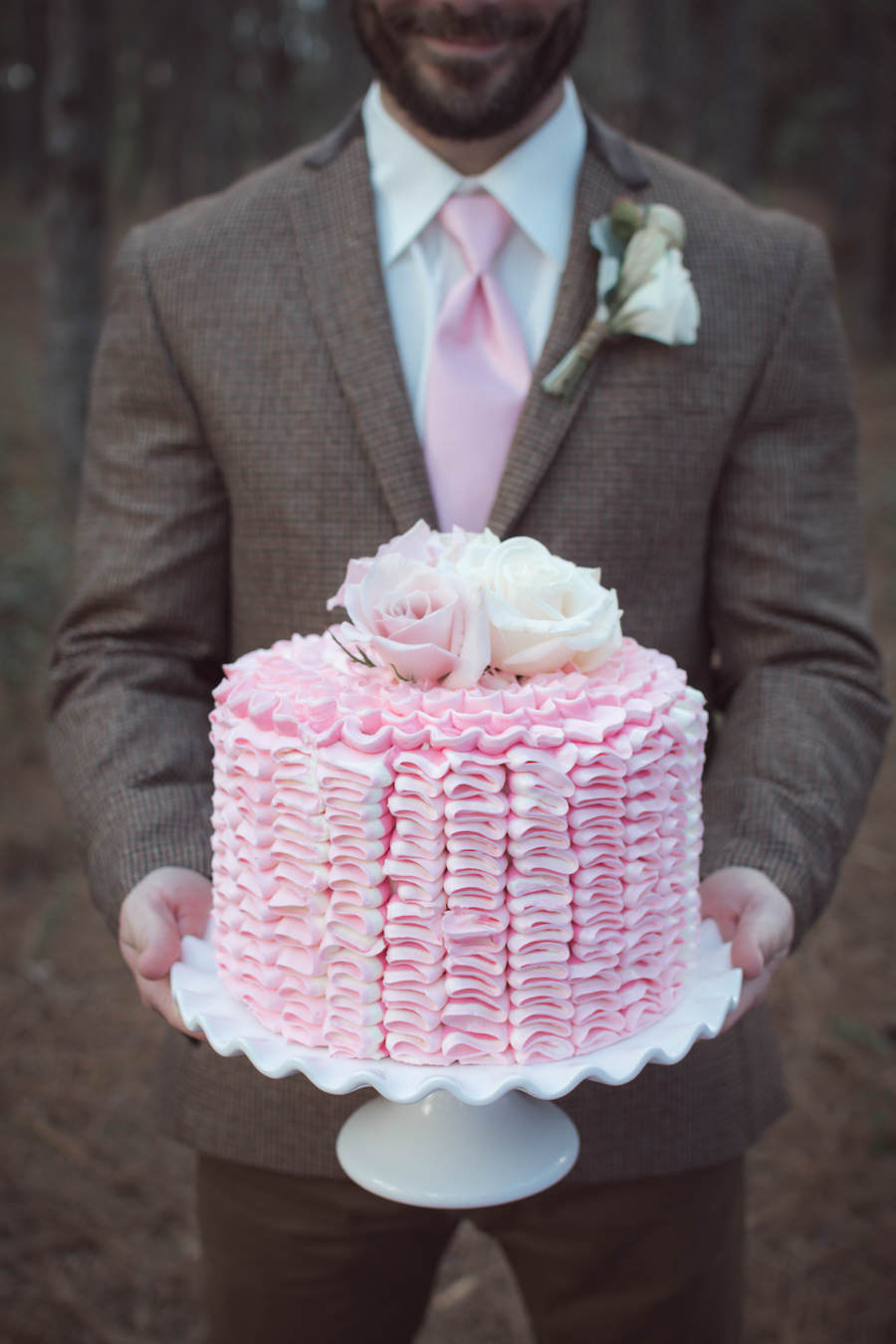 Groomsmen Wedding Portrait Holding Single Tiered Pink Round Wedding Cake