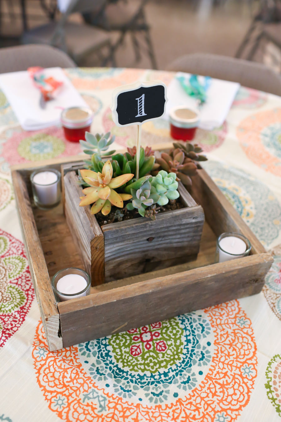 DIY Wedding Reception Succulent Wooden Centerpieces with Vibrant Linen Tablecloth