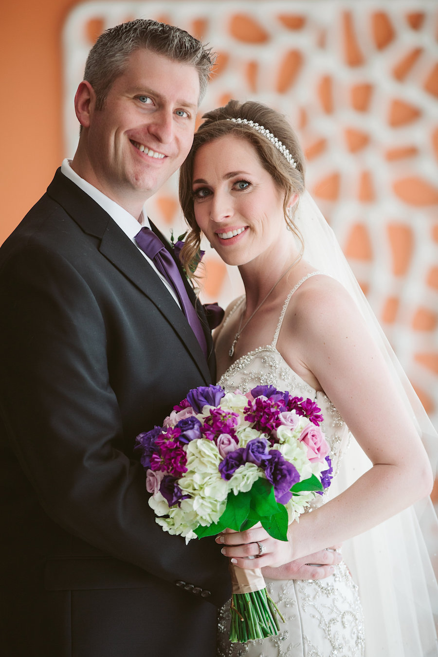 Bride and Groom Wedding Portraits with Purple and White Wedding Bouquet | Clearwater Beach Wedding Florist Iza's Flowers | Wedding Venue Hilton Clearwater Beach