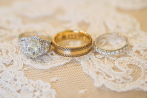 Bride and Groom White and Yellow Gold Wedding and Engagement Ring Portrait on Lace | St Pete FL Wedding Photographer Limelight Photography