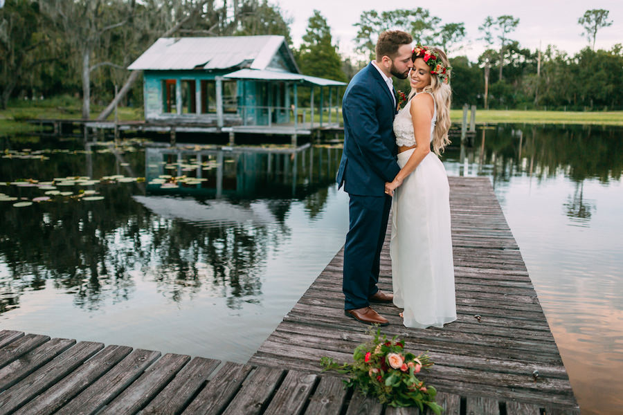 Boho Chic Wedding Portrait with Flower Crown and Waterfront Lake Backdrop Rustic Tampa Bay Wedding Venue The Barn at Crescent Lake at Old McMicky's Farm