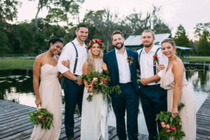 Boho Chic Wedding Party Portrait with Flower Crown at Rustic Waterfront Tampa Bay Wedding Venue The Barn at Crescent Lake at Old McMicky's Farm