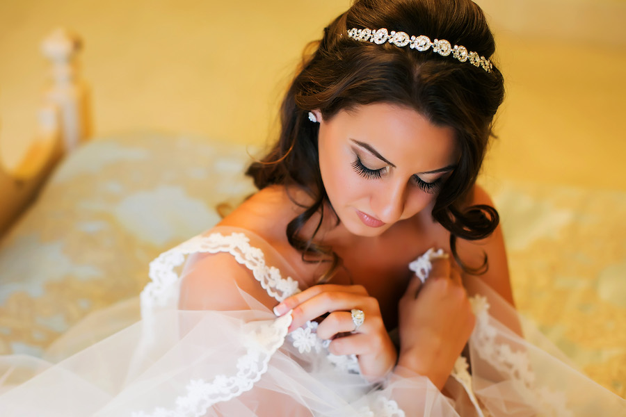 Bridal Gettting Ready Wedding Portrait Draped in Lace Wedding Veil with Rhinestone Headband and Hair in Loose Waves | Downtown St Pete Wedding Photographer Limelight Photography