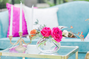 Tropical Inspired Hot Pink, Fuchsia Pink Wedding Centerpiece on Brass Coffee Table | Tampa Bay Vintage Wedding Rental Furniture The Reserve Vintage Rentals