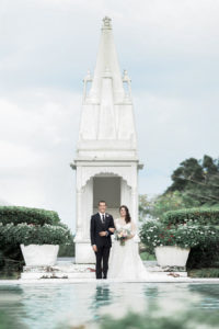 Bride and Groom Outdoor Lakeland Wedding Portrait in Front of Fountain
