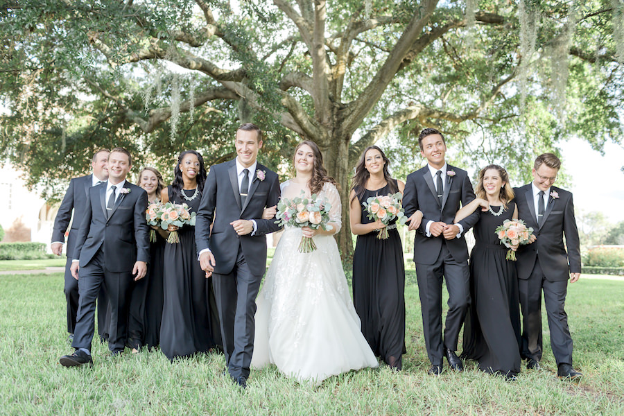 Outdoor Lakeland Wedding Party Portrait | Black Paper Crown Bridesmaids Dresses with Hayley Paige Wedding Gown