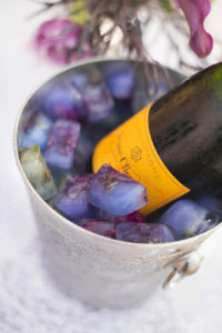 Veuve Clicquot Champagne in Bucket with Flower Filled Ice Cubes