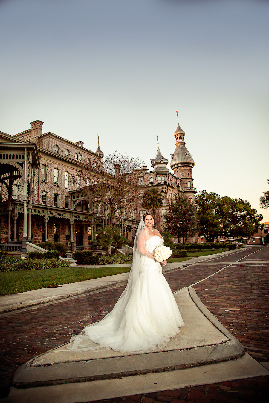 Outdoor, Bridal Wedding Portrait in Strapless, Ivory Wedding Dress and Ivory Bridal Bouquet | Downtown Tampa Wedding Venue University of Tampa