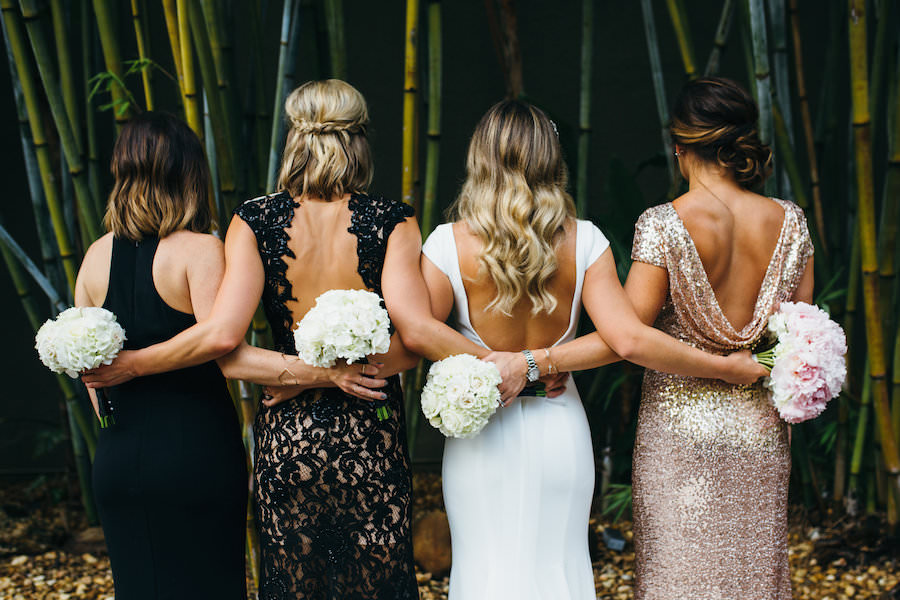 Bridal Party Wedding Portrait with Mismatched Black and Gold Bridesmaid Dresses and Ivory, Sheath Backless Mikaella Wedding Dress