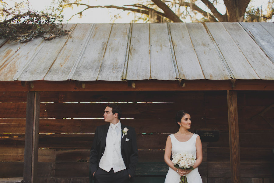 Bride and Groom, Outdoor Barn Wedding Portrait in Anna Kara Wedding Dress and Black Suit | Rustic Tampa Bay Wedding Venue Cross Creek Ranch
