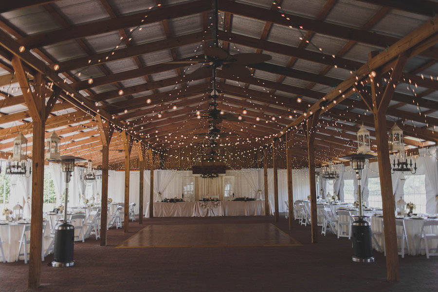 Outdoor Barn Wedding Reception Decor with String Lighting | Tampa Bay Wedding Venue Cross Creek Ranch