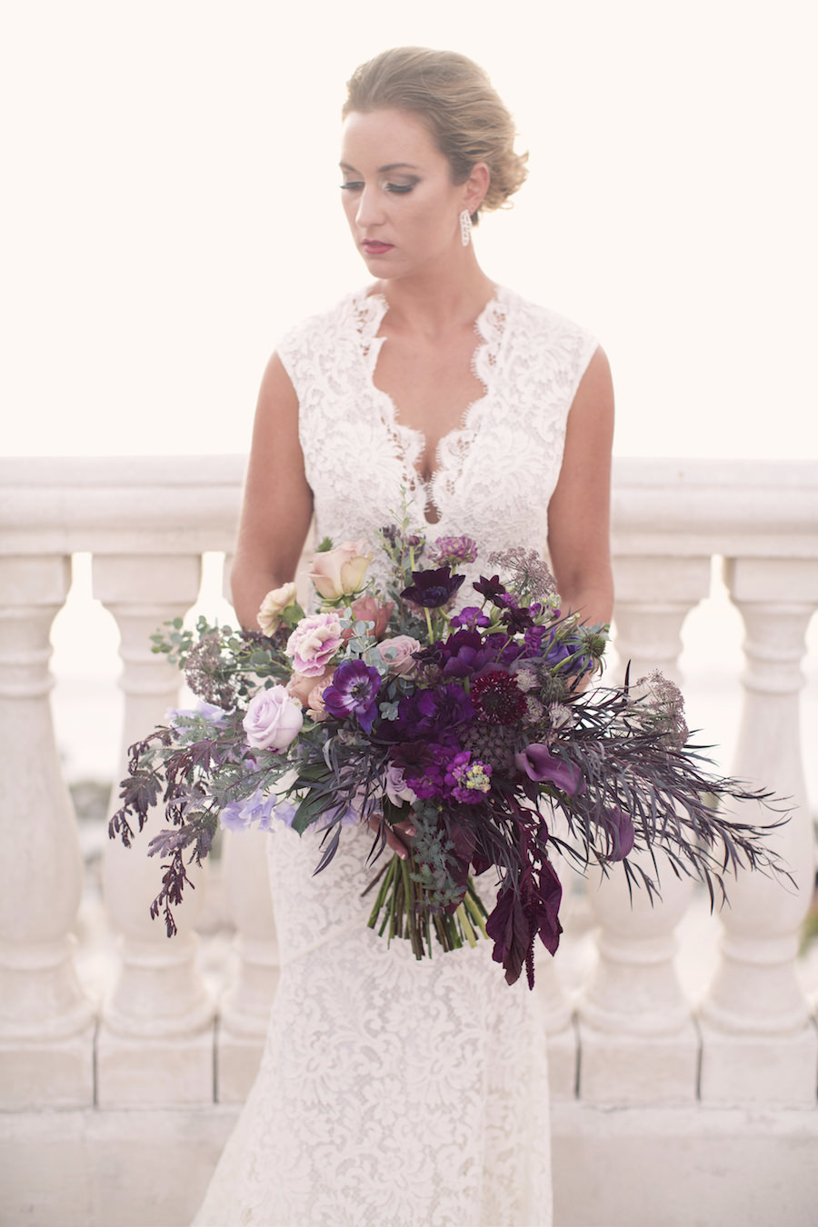 Lace Wedding Dress from The Bride Tampa | Large Purple and Blush Pink Wedding Bouquet | Clearwater Wedding Photographer Djamel Photography