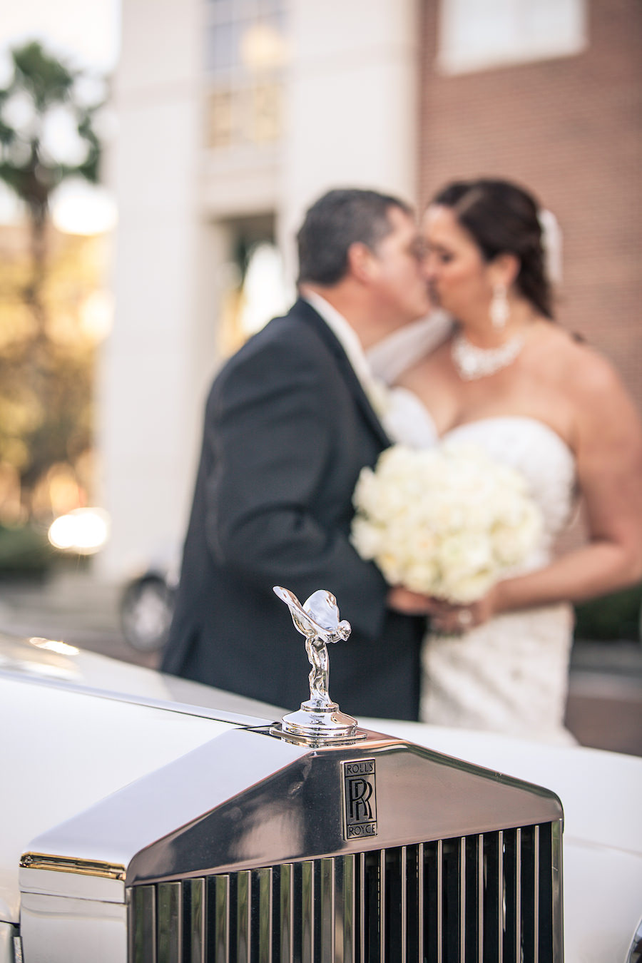 Bride and Groom Outdoor Downtown Tampa Wedding Portrait on Brick Road with Vintage Rolls Royce Car | Tampa Wedding Planner UNIQUE Weddings and Events