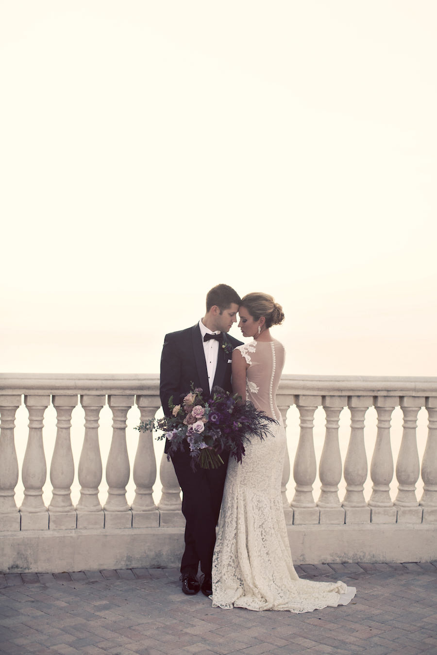 Bride and Groom Wedding Portrait | Lace Wedding Dress from The Bride Tampa | Large Purple and Blush Pink Wedding Bouquet | Clearwater Wedding Photographer Djamel Photography