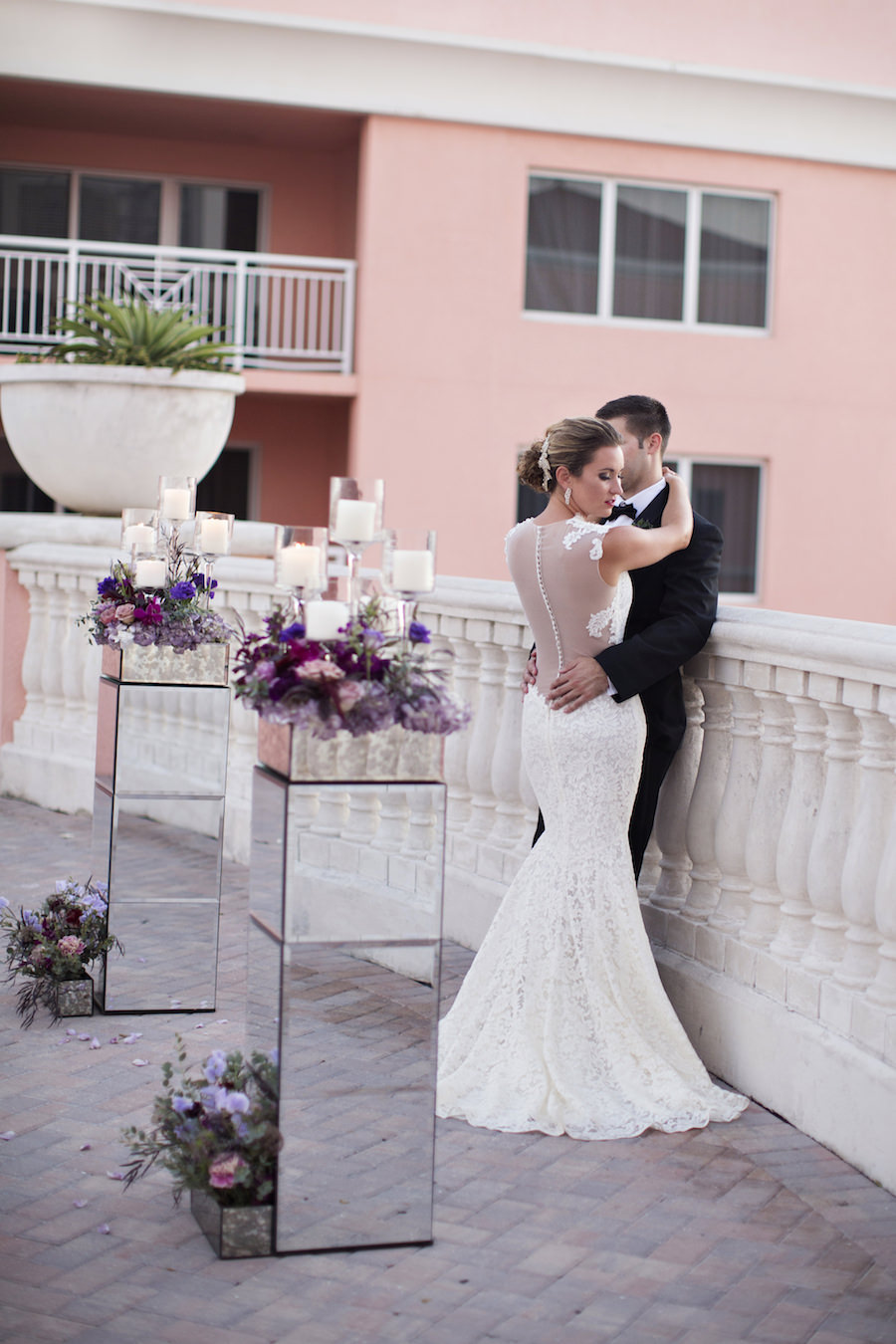 Mirrored Wedding Ceremony Decor Floral Stands | Bride and Groom Wedding Portrait | Lace Wedding Dress from The Bride Tampa | Large Purple and Blush Pink Wedding Bouquet | Clearwater Wedding Photographer Djamel Photography