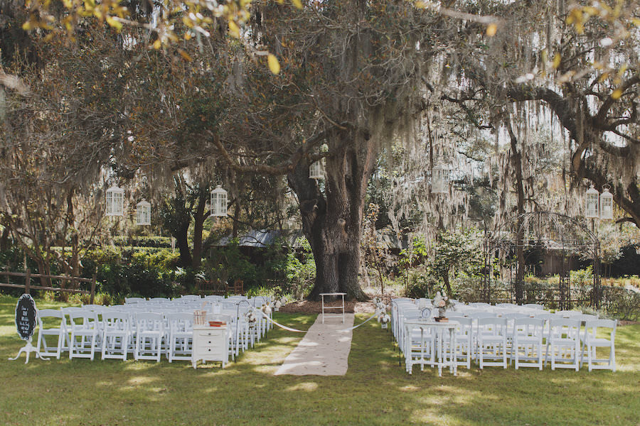 Outdoor Rustic Wedding Ceremony Under Tree with Hanging Lanterns | Tampa Bay Wedding Venue Cross Creek Ranch