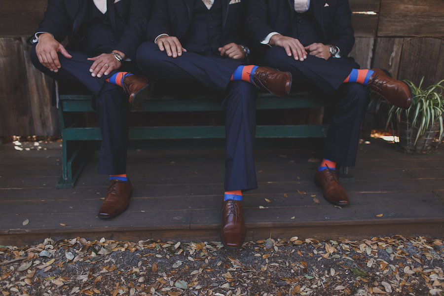 Groomsmen Wedding Portrait in Navy Tuxedos with University of Florida Orange and Blue Socks