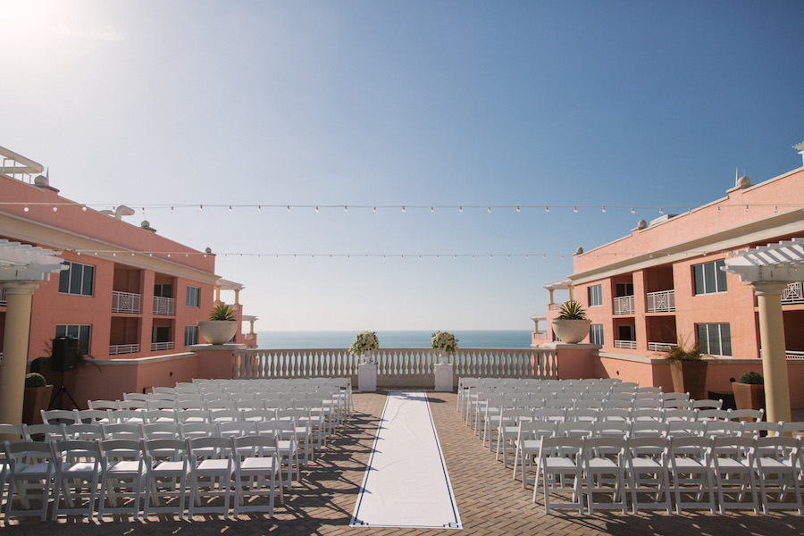 Classic, Elegant White Wedding Ceremony Decor Flowers on Pedestal | Clearwater Beach Hotel Wedding Venue | Hyatt Regency Clearwater Sky Terrace Outdoor Ceremony