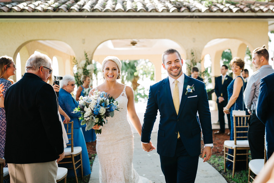 Bride and Groom Walking Down Aisle After Outdoor Wedding Ceremony | Sarasota Wedding Planner Nicholle Leonard Designs