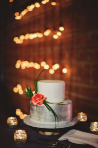 Monder Chic-Inspired Two Tier Round White and Silver Wedding Cake with Rose Accent
