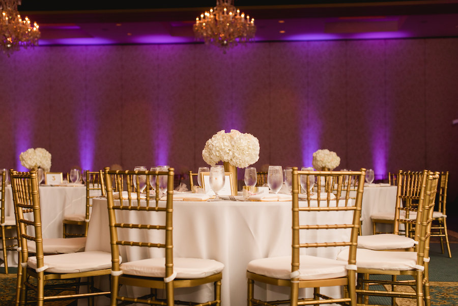 White Hydrangea Centerpieces with Gold Vase and Table Number and Gold Chiavari Chairs | Elegant Ballroom Wedding Reception Decor Inspiration | Tampa Country Club Wedding Venue The Palmetto Club
