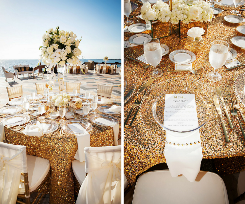 Gold Sequined Linens, Beaded Glass Chargers with Chiavari Chairs in White Draped Chair Covers and Tall Centerpieces | Outdoor Waterfront Wedding Reception | Historic Sarasota Wedding Venue Ringling Museum - Ca'd'Zan Mansion | Limelight Photography | Wedding Planner NK Productions