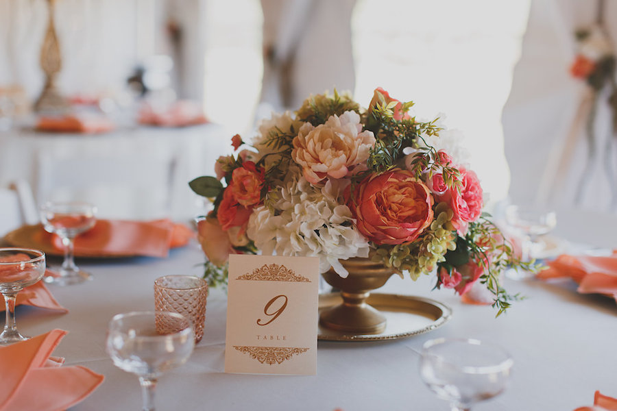 Blush Pink, Salmon and Ivory Hydrangea and Peony Wedding Centerpiece Flowers in Brass Vase with Gold Table Numbers