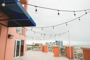 Rooftop Oceanfront Tampa Bay Wedding Reception with String Lights | Waterfront Wedding Venue Hyatt Regency Clearwater Beach | Gabro Event Services