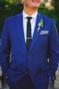 Groom Wedding Portrait in Blue Suit with Checkered Pocket Square