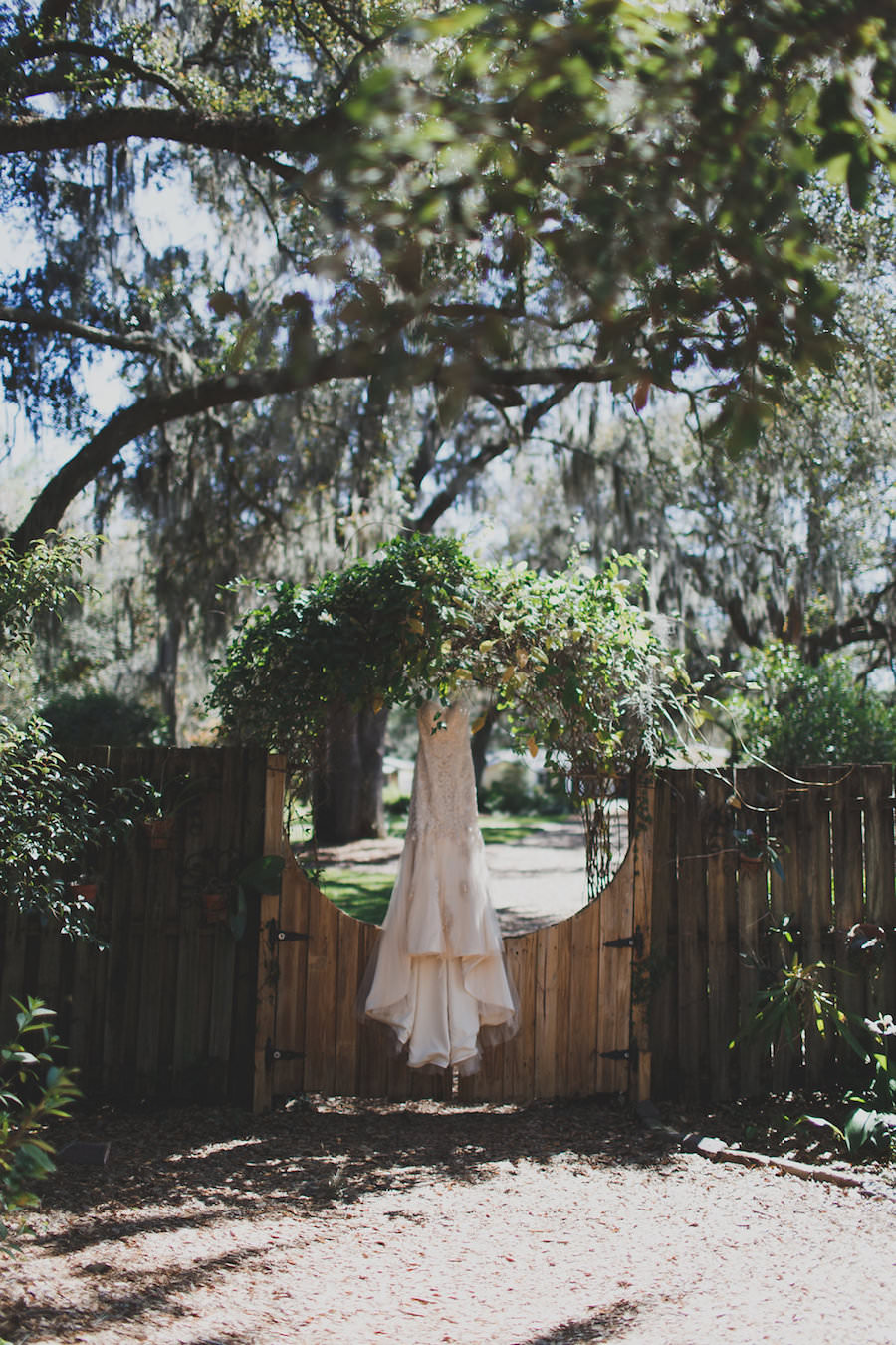 Cream Beaded Sweetheart Trumpet Wedding Dress in Rustic Setting with Trees