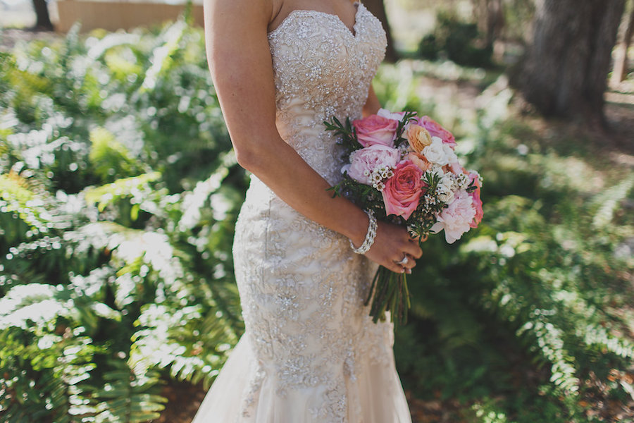 Cream Beaded Sweetheart Trumpet Wedding Dress with Blush Pink and Salmon Wedding Bouquet of Roses, Peonies, Baby's Breathe and Greenery