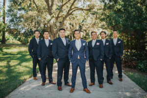 Bridal Party Groomsmen Portrait Dark Blue Suits | Tampa Bay Wedding Photographer Rad Red Creative