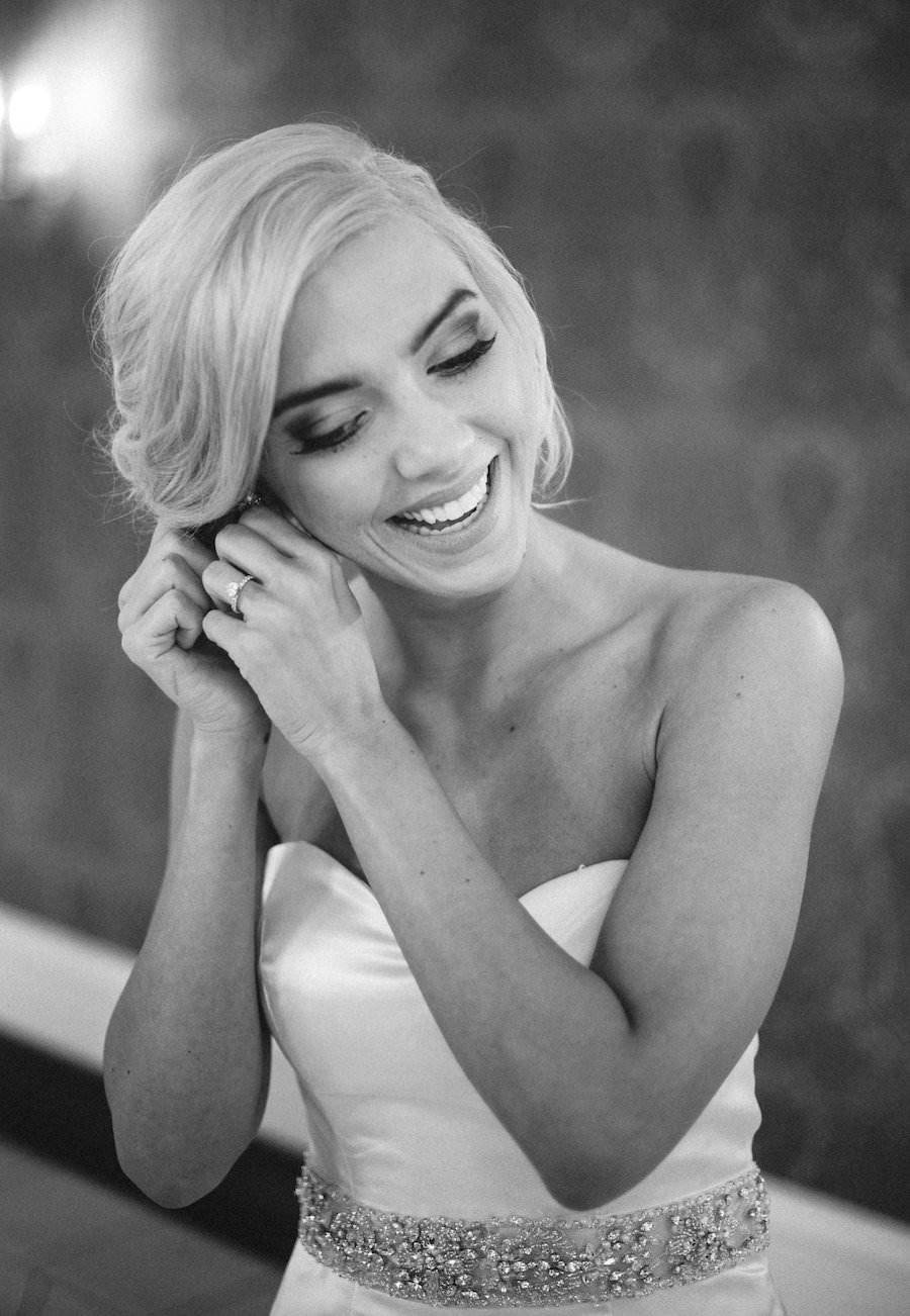 Bride Getting Ready Putting on Jewelry on Wedding Day