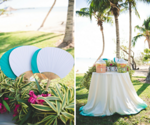 Bahamas Destination Beach Caribbean Lawn Grass Ceremony Venue with Cooling Drink Station with Paper Fans | Aisle Society Weddings Abaco Beach Resort
