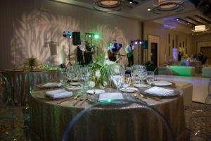 Modern Gold South Beach Inspired Wedding Reception Decor with Ghost Chairs from A Chair Affair and Gold Linens from Over the Top Linen Rentals | Clearwater Beach Wedding Venue Wyndham Grand | Wedding Planner Parties a la Carte
