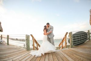 Outdoor, Bride and Groom Waterfront Wedding Portrait on Dock at St. Petersburg Wedding Venue Isla Del Sol Yacht and Country Club